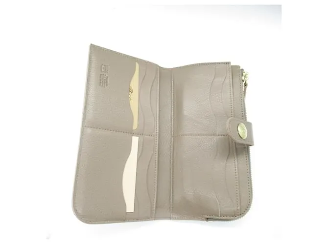 Billetera bi-fold de cuero gris Il Bisonte Castaño 