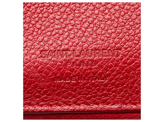 Billetera bi-fold de cuero rojo Saint Laurent Roja 