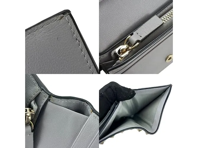 Billetera bifold de cuero gris Valentino Garavani Castaño 