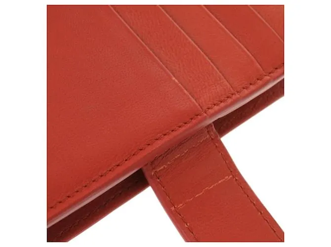 Billetera bifold de cuero Intrecciato de Bottega Veneta Castaño Roja 