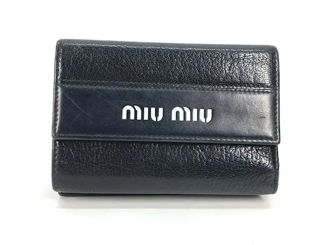 Billetera compacta bicolor Miu Miu Negro Blanco 