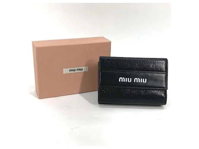 Billetera compacta bicolor Miu Miu Negro Blanco 