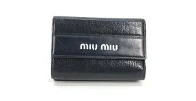 Billetera compacta bicolor Miu Miu Negro Blanco 