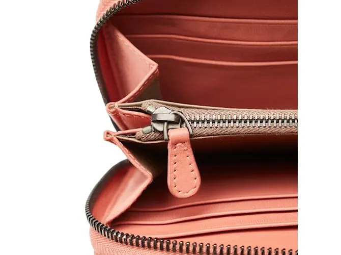 Billetera con cremallera Bottega Veneta de cuero Intrecciato en muy buen estado Rosa 