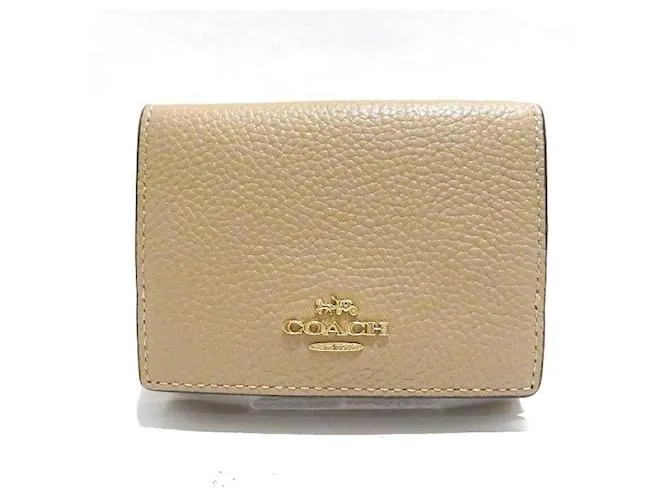 Billetera de cuero Coach con tres pliegues Castaño Beige 