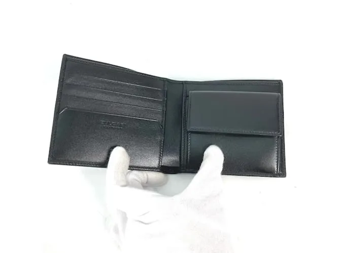 Bulgari Billetera bi-fold de cuero negro Bvlgari 