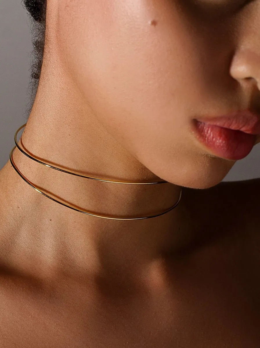 Choker rígido doble raíl de plata baada en oro